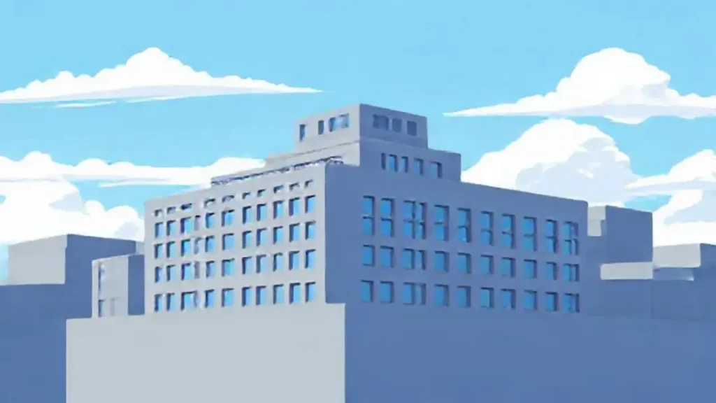 Edificio gris contra cielo azul