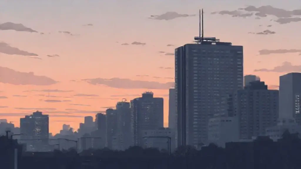 La ciudad gris se oscurecía al atardecer