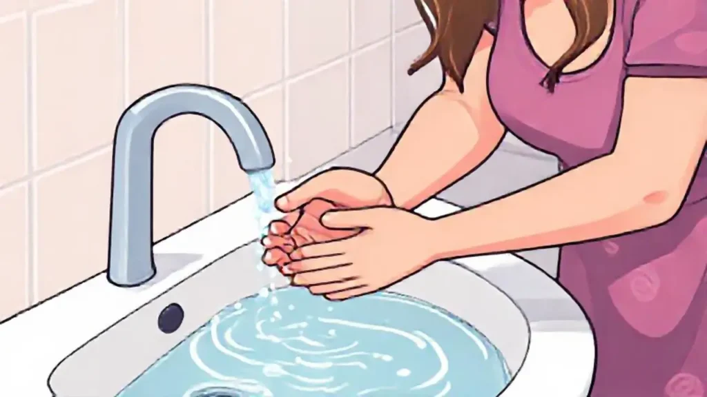 Mujer lava las manos