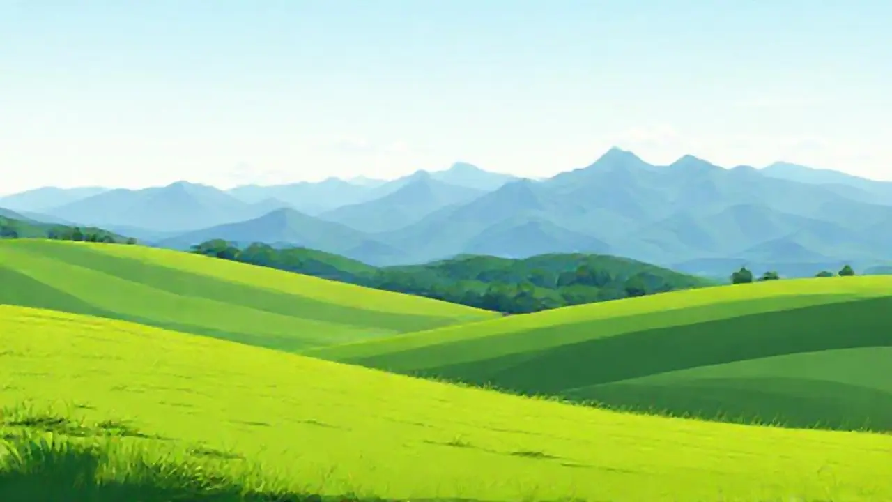 Pradera y montañas lejanas