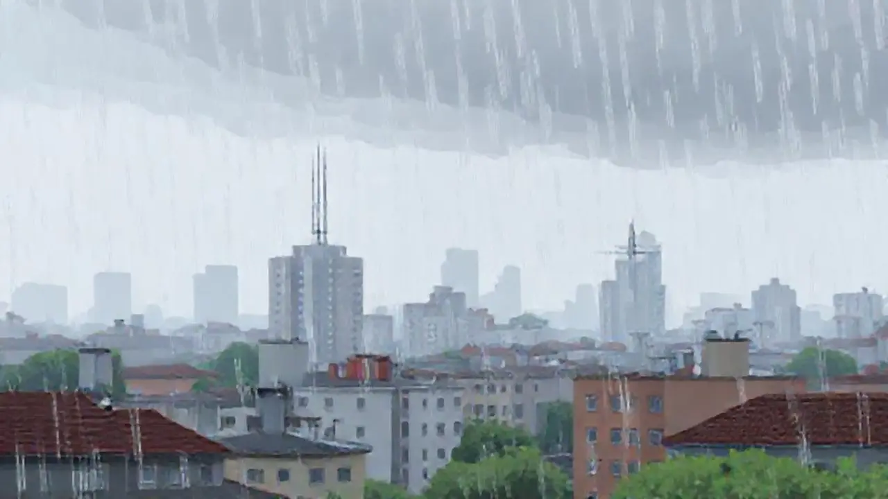 Lluvia gris sobre edificios lejanos