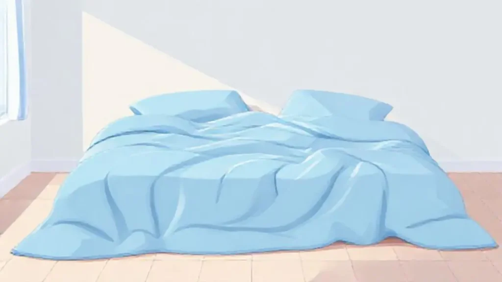 Manta azul suave sobre la cama