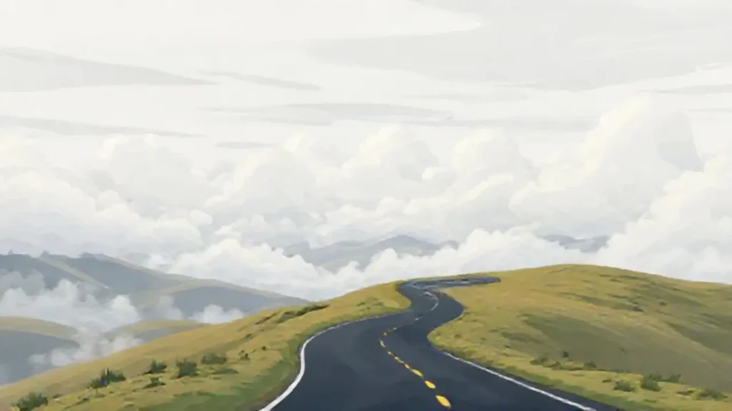 Nubes grises sobre un camino sinuoso