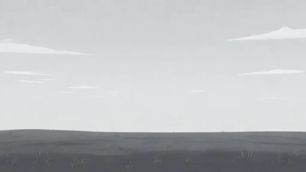 Cielo gris sobre campo vacío