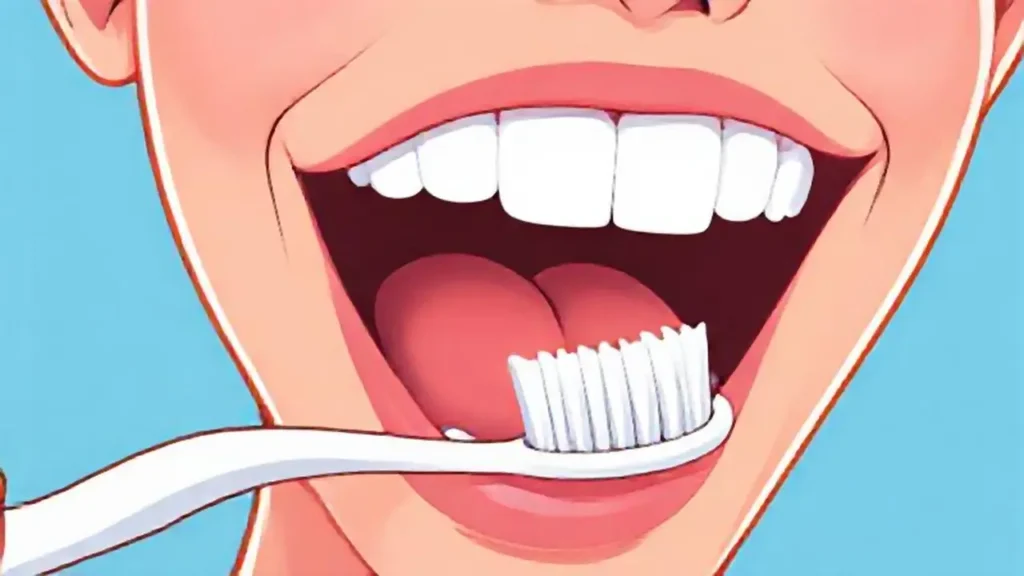 Cepillo de dientes blanco junto a la boca abierta