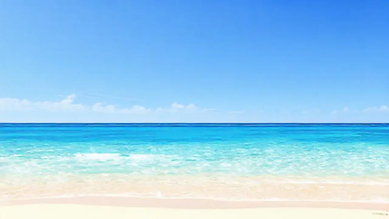 Agua turquesa y playa extensa