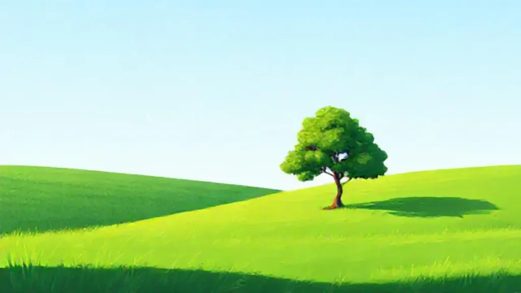 Campo verde con un árbol solitario