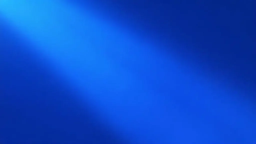La pantalla azul brillaba suavemente