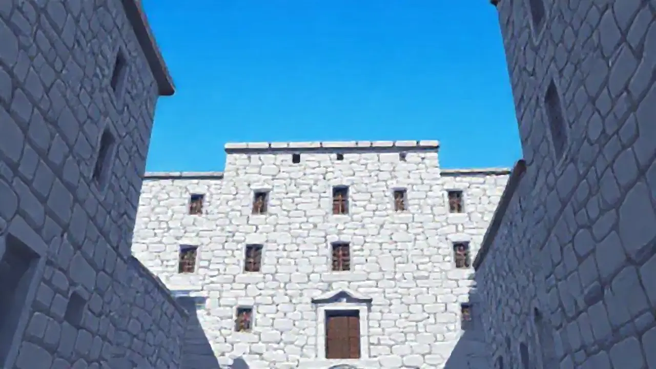 Edificio gris bajo cielo azul