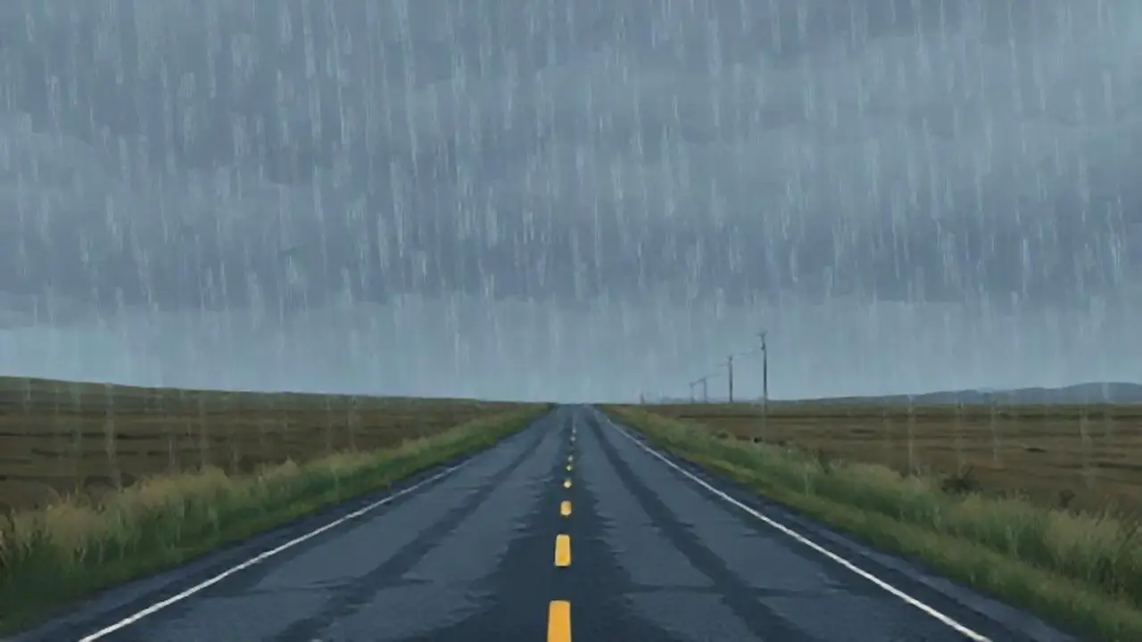 Lluvia gris sobre una carretera solitaria