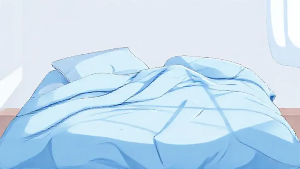 Manta azul suave en la cama