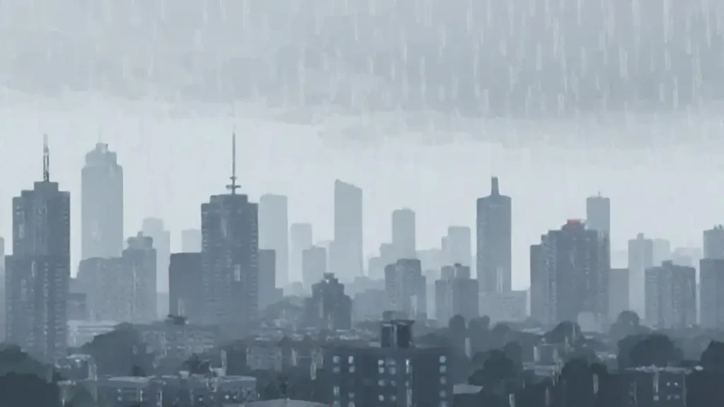 Ciudad gris bajo lluvia suave