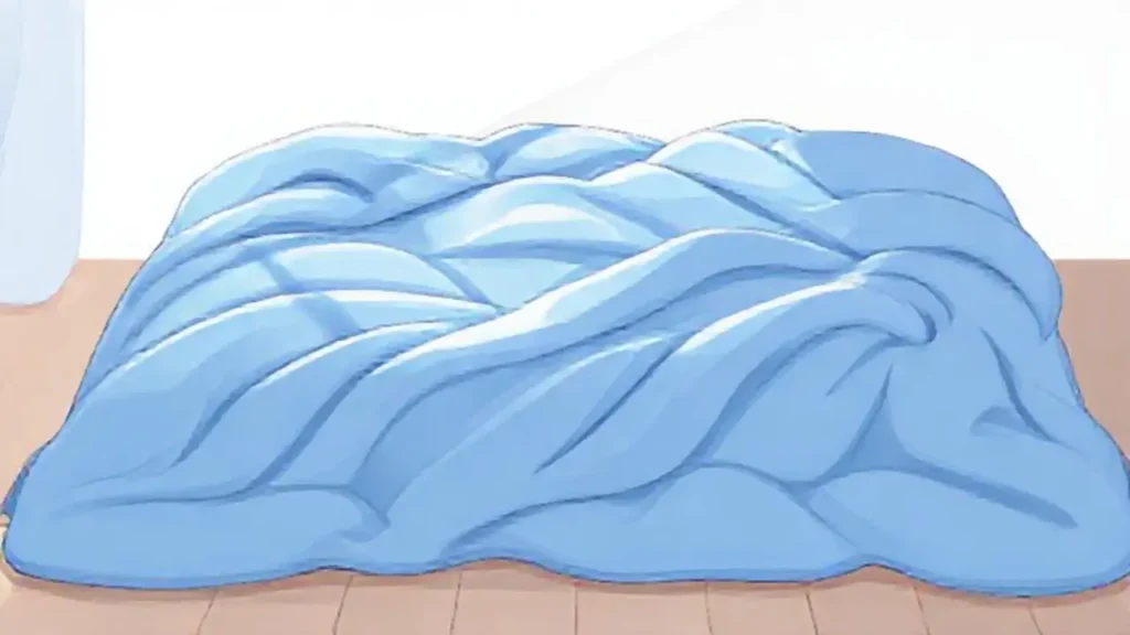 Manta azul suave en la cama
