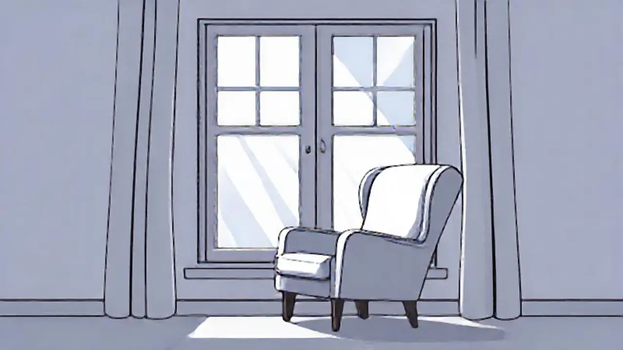 Silla gris junto a la ventana