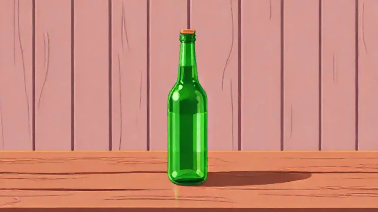 Una botella verde sobre una mesa de madera