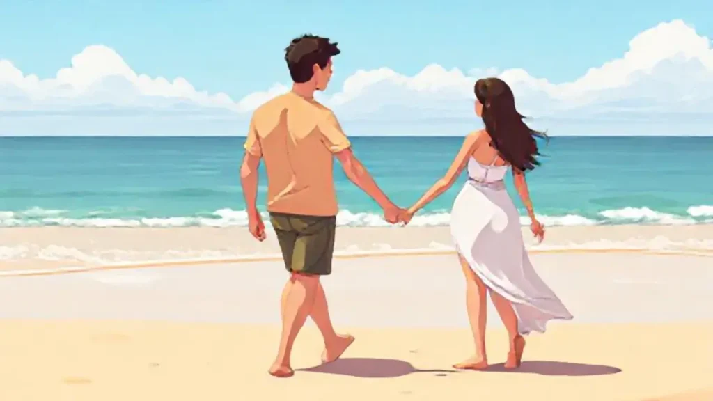 Dos personas tomadas de la mano en la playa