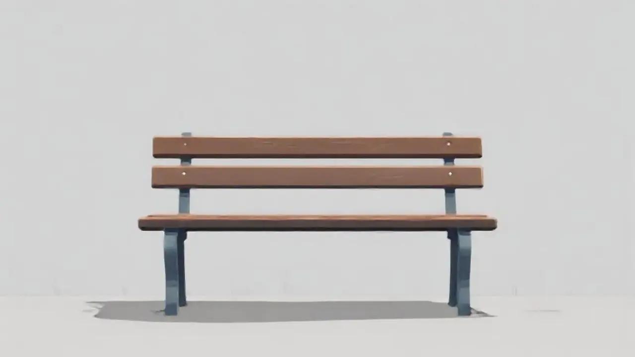 Un banco vacío bajo un cielo gris