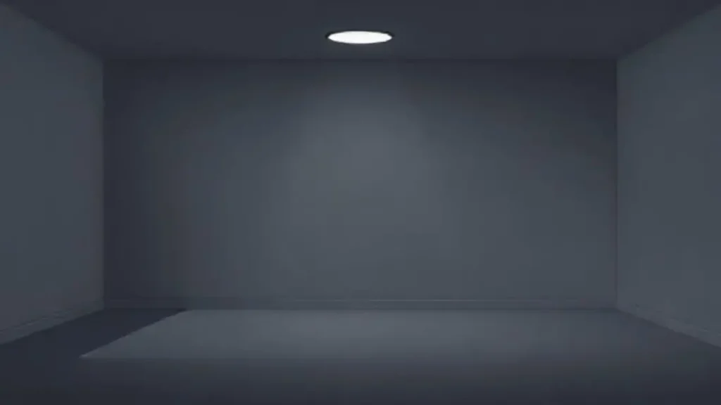 Habitación gris vacía en penumbra
