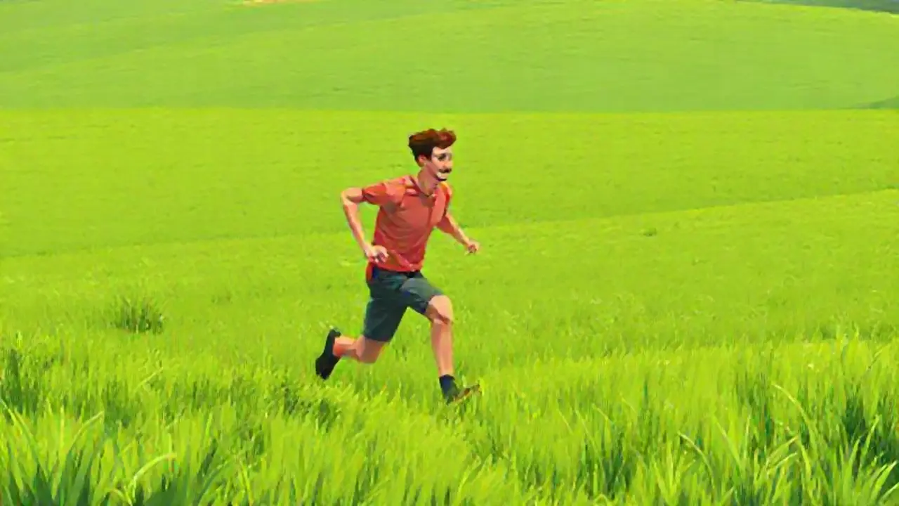 Un hombre corre por un campo verde